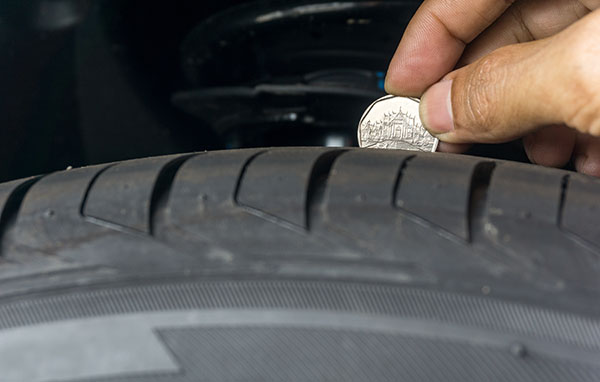 How to Master the Penny Test for Tire Health | Kamphaus Auto Care
